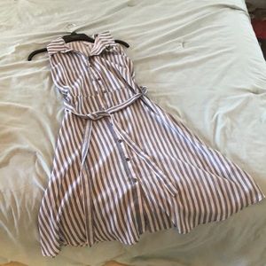 Striped dress, with tie around waist.